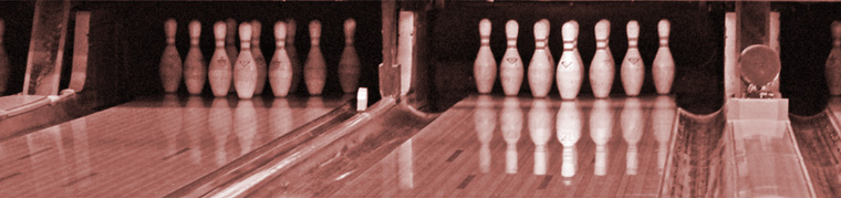 Photo of bowling lanes and pins